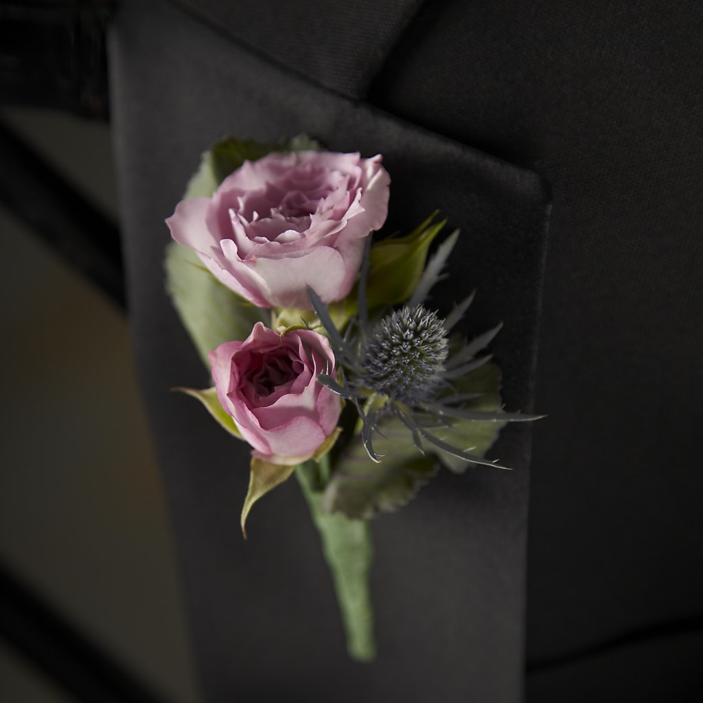 Veronica Boutonniere – Flowers By Robert Taylor Inc, West Covina CA